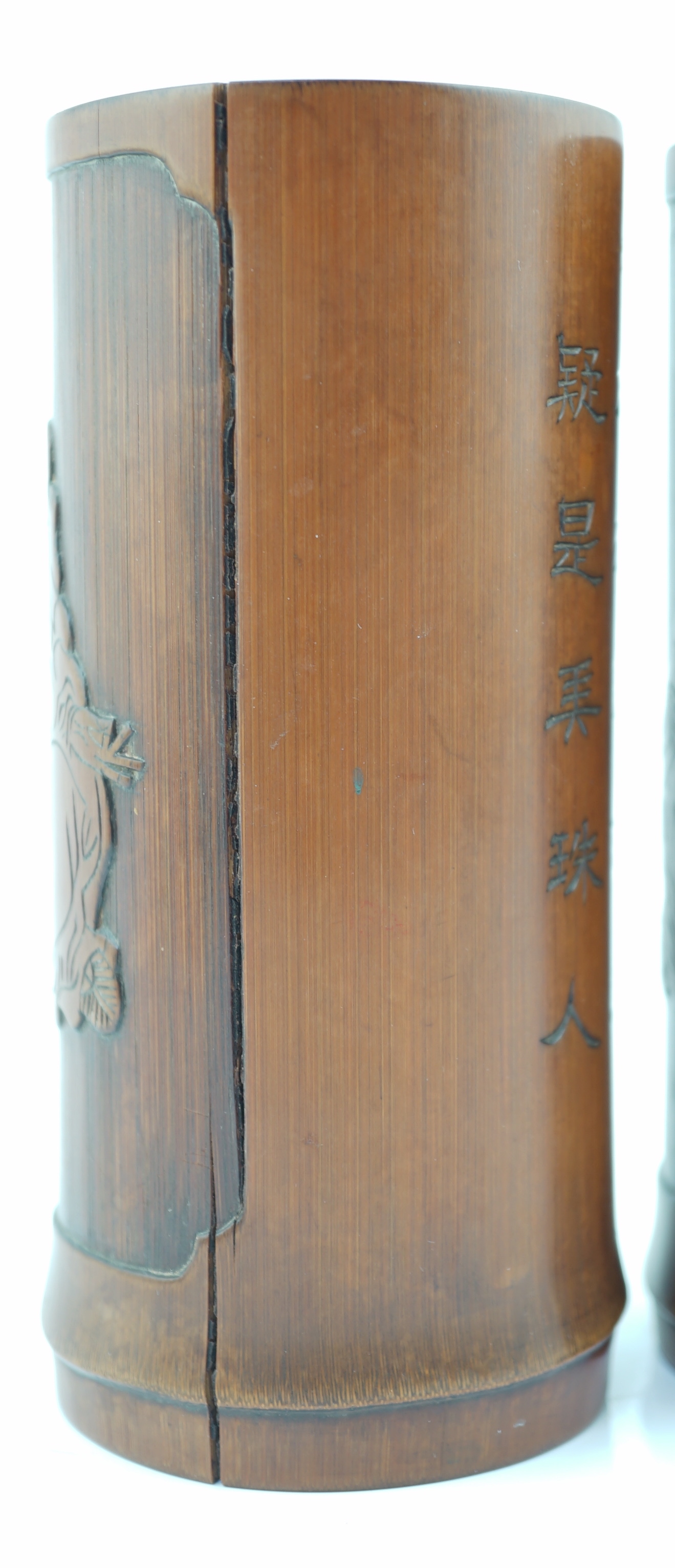 A pair of Chinese inscribed 'Damo' bamboo brushpots, 19th century, age cracks